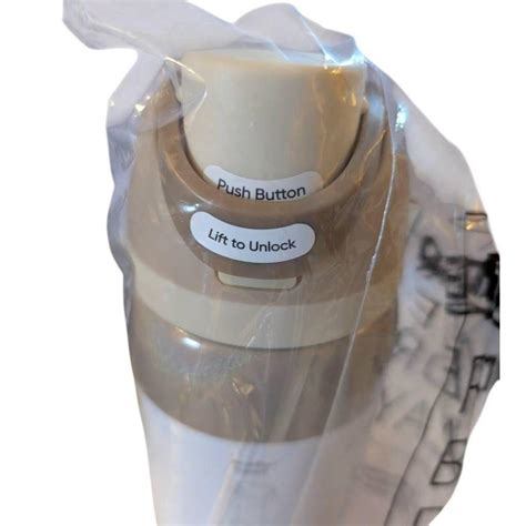 A brand new Owala Holiday Magic Water Bottle, 32 oz.... - Depop