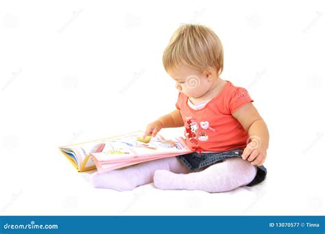 Baby girl with book stock image. Image of cute, joyful - 13070577
