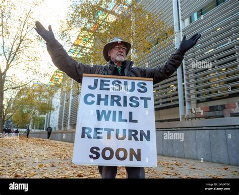 Religious Evangelical Christian man wearing sign proclaiming the return ...