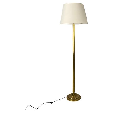 Italian mid-century modern Floor lamp in withe fabric brass by Lam ...