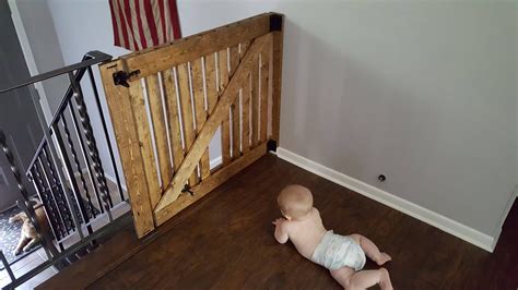 Diy barn door baby gate with pet door instructions – Artofit