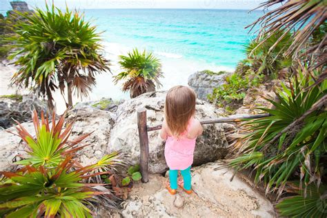 Little girl watching a beach view 20092807 Stock Photo at Vecteezy