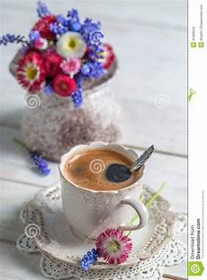 fiori coffee cup of coffee and flowers stock photo image fiori coffee cup of coffee and flowers stock photo image