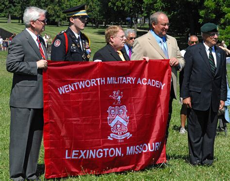 Participants hold a flag reading “Wentworth Military Academy Lexington ...