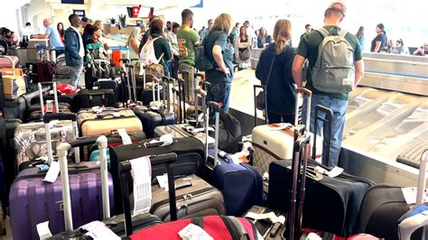 Video shows backup, long lines at DFW Airport baggage claim after ...