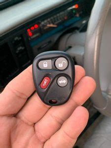 How to Program Key FOB 2004 GMC Envoy 的图像结果