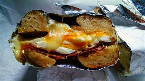 Bacon, Egg, and Cheddar on a Poppy Seed Bagel (Black Seed Bagel, NYC ...