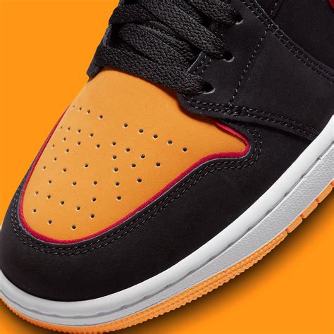 Air Jordan 1 Mid "Black/Vivid Orange" FJ4923-008 | SneakerNews.com