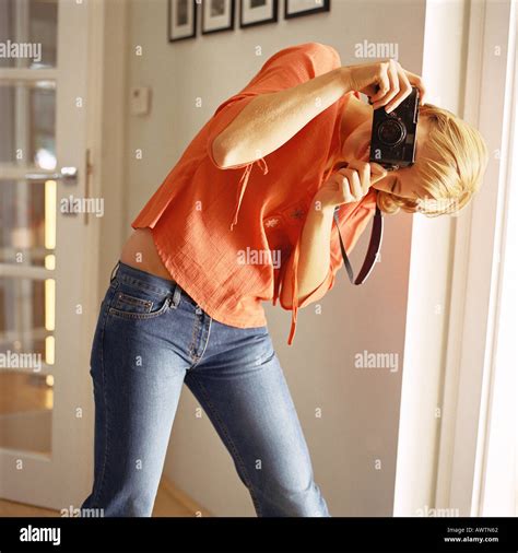 Girl bending over hi-res stock photography and images - Alamy