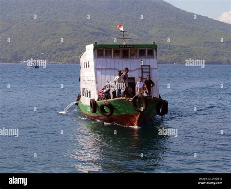 Maumere, Indonesia-May 23, 2023: An inter-island ferry in Indonesia is sailing from the port of ...