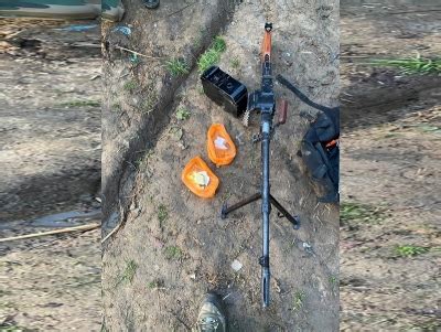 Militants flee Kulgam home, leave machine gun & IED material behind