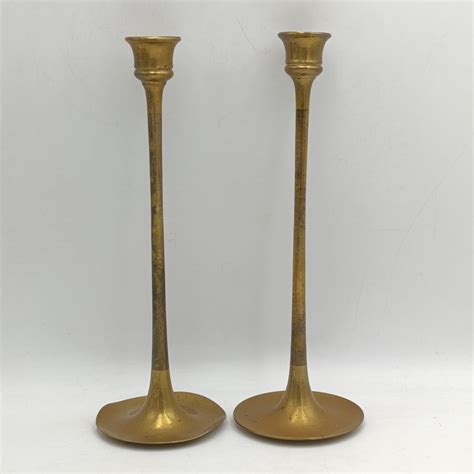 Two vintage brass candle holders