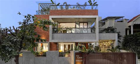 An open central courtyard binds all three floors of this family home ...