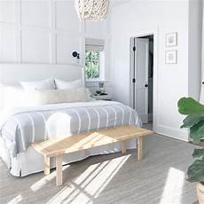 Small Bedroom Rugs by White Wingback Bed On Gray Jute Rug Cottage Bedroom Small Bedroom Rugs