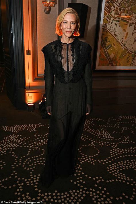 Cate Blanchett wows in a semi-sheer dress as she presents Guillermo del ...