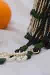 Buy Green Embroidered Shayna Bead Tassel Potli Bag by EENA Online at ...