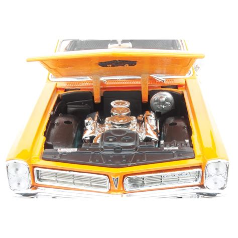 Maisto 1965 Pontiac GTO Orange 1:18 – Krazy Caterpillar