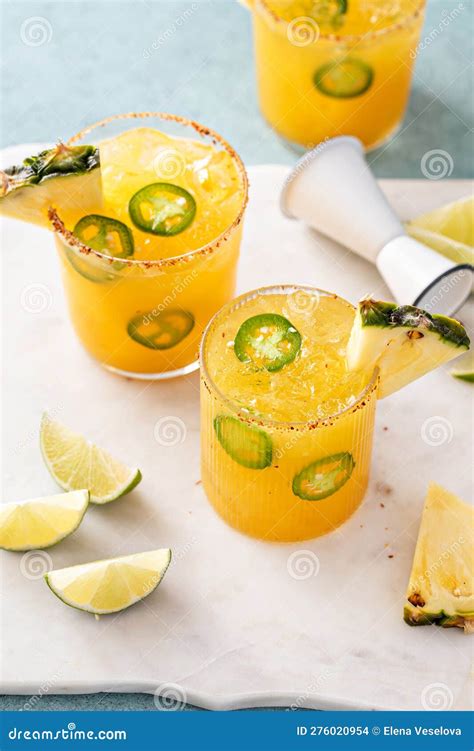 Pineapple Jalapeno Margarita Cocktail in Glasses with Tajin Rim Stock ...