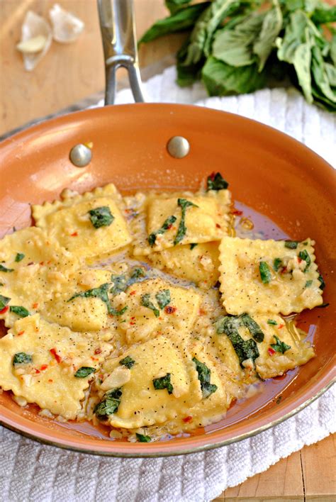 Creamy cheese ravioli sauteed in a light sauce of garlic and basil ...