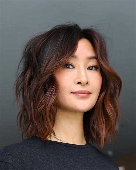 Step Cut Hairstyle For Medium Wavy Hair