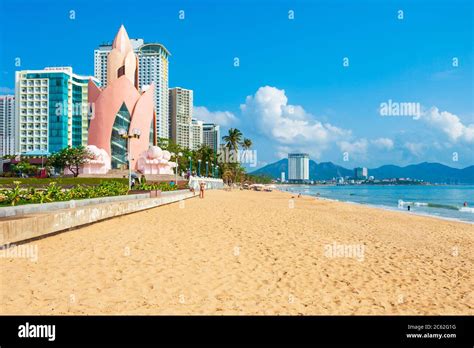 Photograph of Nha Trang beach with many high rise buildings behind it