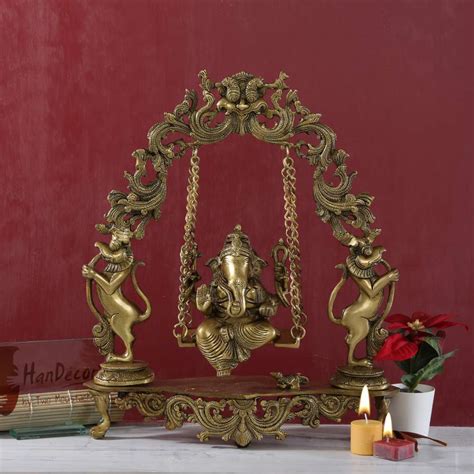 Buy Handcarved Lord Ganesha on Jhoola Brass Showpiece Online at Best Price
