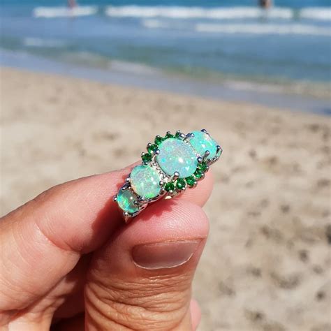 emerald cut opal engagement ring