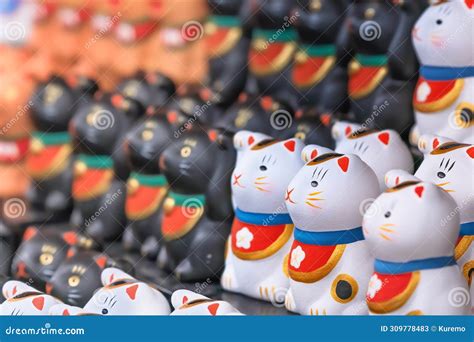 A Bunch of Aligned Hand Painted White Japanese Manekineko Cats. Stock Image - Image of mascot ...