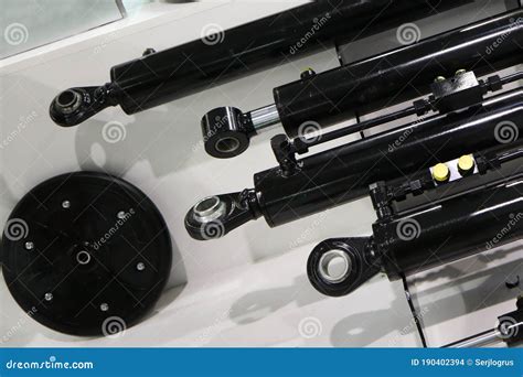 Rods of Hydraulic Cylinders and Roller Cultivator Stock Photo - Image of grain, hydraulics ...