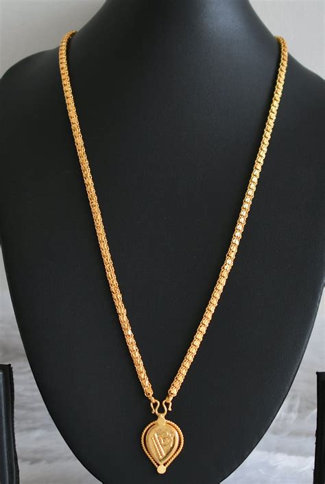 Gold tone 24 inches heart chain with om pendant dj-48249 – dreamjwell