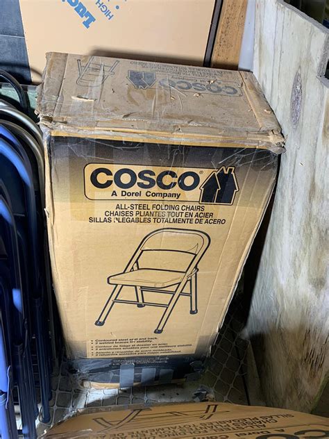 Lot 2194 - Group Lot of Folding Chairs Some still in COSTCO Boxes | Burns Auction & Appraisal