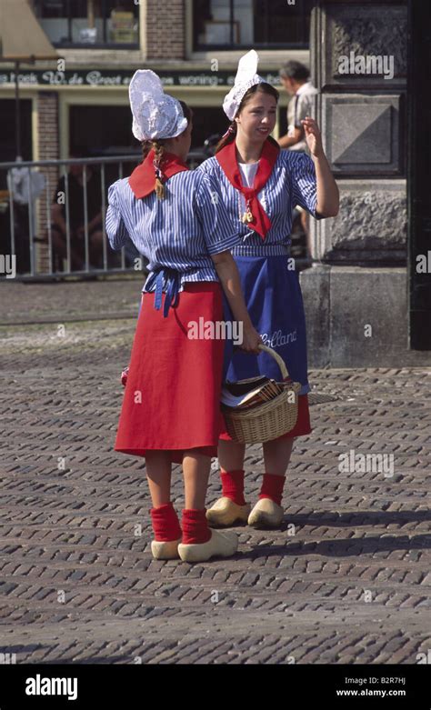 Girls in Traditional Dutch dress. Alkmaar, Netherlands Stock Photo ...