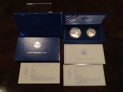 1986 US LIBERTY COINS - SILVER DOLLAR & HALF DOLLAR, ELLIS ISLAND ...