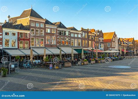 Old Town Market Square with Typical Dutch Houses and Cafes in Delft ...