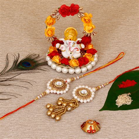 Designer Bhaiya Bhabhi Rakhi with Lord Ganesha Idol on Decorative Plate ...