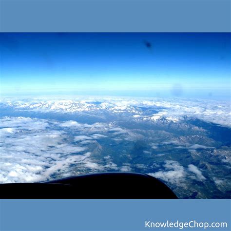 view from plane flying over France and Italy | 🥷 Knowledge Ninja