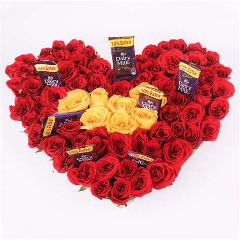 92 Red Roses 8 Yellow Roses 7 Dairy Milk Chocolates – SahniBakery