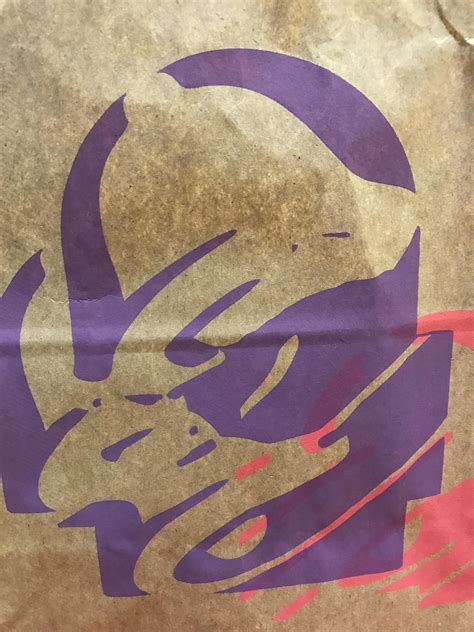This Taco Bell bag looks like a Fireman holding a baby : r ...