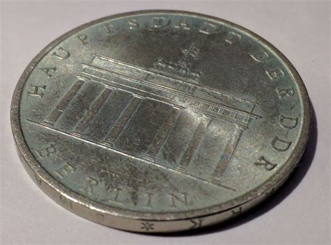 PVC damage or something else? – Numista