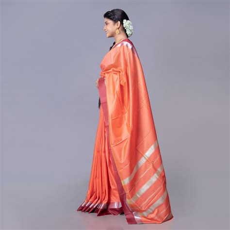 Kanjivaram silk saree in rust color with maroon and silver border – Boveee