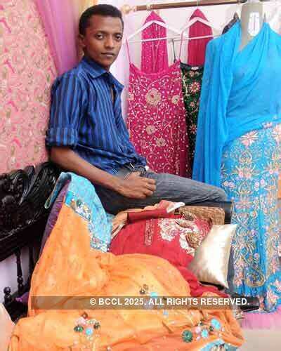Sidneyss poses with his bridal collection during a photo shoot ...