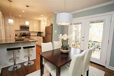 The Table That Splits The Kitchen In Two by Split Level Opened Up Kitchen Pendant Table And The Table That Splits The Kitchen In Two