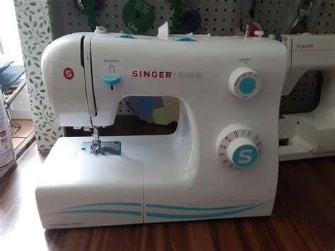 Image result for How to Thread a Singer Simple 2263