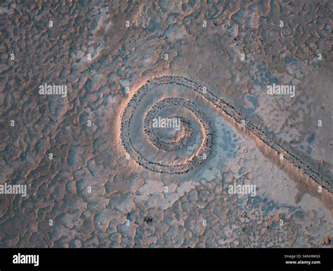 Aerial view of spiral jetty with beautiful patterns in a barren ...