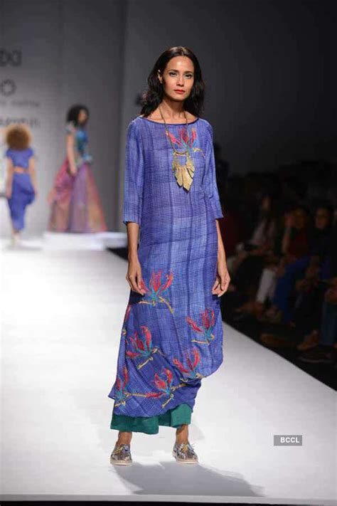 A model walks the ramp for designer Krishna Mehta on Day 1 of the ...