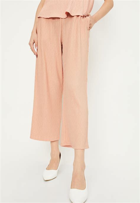 Buy Women Regular Fit Knitted Trousers Online at just Rs. 999.0 ...