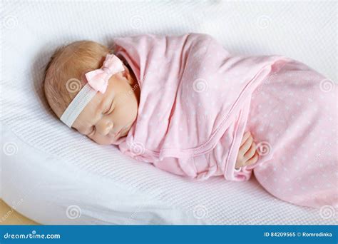 One Week Old Newborn Baby Girl Sleeping Wrapped in Blanket Stock Image ...