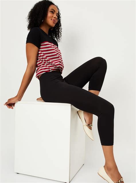 Buy Women Solid Elasticated Capri Leggings Online at just Rs. 349.0 ...