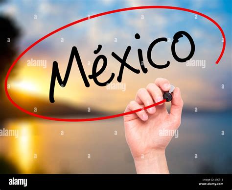 Man Hand writing Mexico (In Spanish) with black marker on visual screen ...