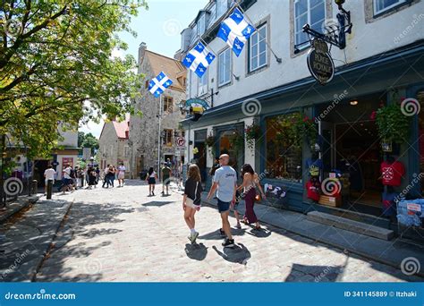 Pepole Wolking in the Streets of Historic Quebec City are in the Walled Section of the Capital ...